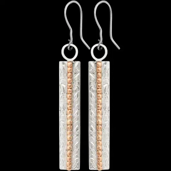 The simple and elegant design of the Dogwood Earrings will pair nicely with any western outfit. Featuring a hand engraved German Silver base and decorated with bronze beads. Order now!